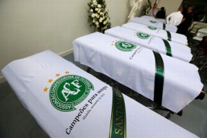 blankets-bearing-the-crest-of-brazilian-soccer-team-chapecoense-are-placed-on-coffins-holding-the-re